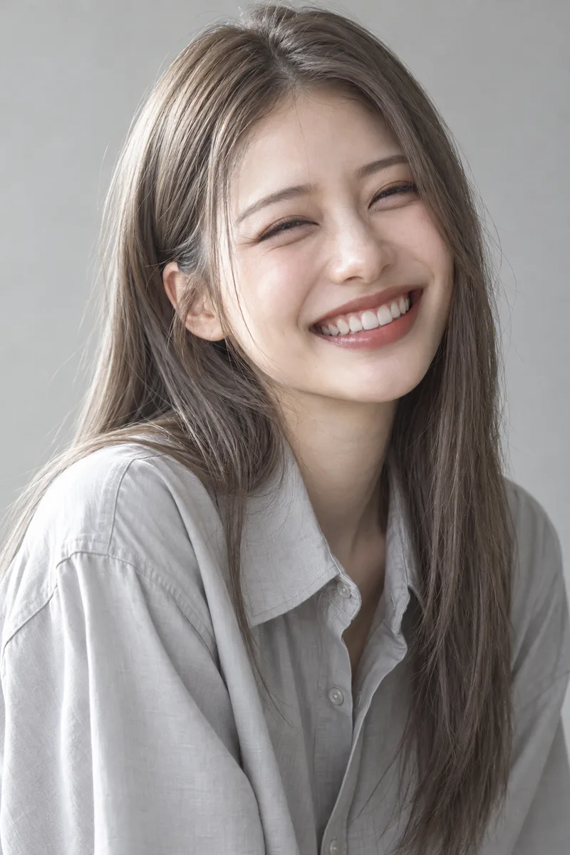 smiling so widely that her eyes squeeze into thin happy crescent lines, cheeks pushed up, big grin showing teethで生成した例（2枚目）